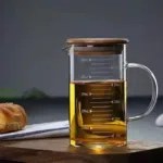 كوب قياس متدرج بمقبض وغطاء متين من الخيزران - زجاج بوروسيليكات - (500 مل) - الصورة 5
