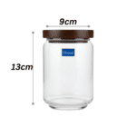 ⁦برطمان زجاجي من أوشن بوب سعة 650 مل مع غطاء خشبي - وعاء محكم الإغلاق لتخزين السكر والتوابل والمكسرات والأطعمة الجافة - صنع في تايلاند⁩ - الصورة ⁦3⁩