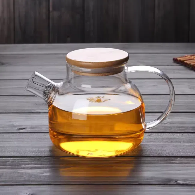 High Borosilicate Pyrex Glass Teapot With Stainless Steel Filter And Bamboo Lid -(1000Ml) With 4 small Cups (75ml) - Image 7