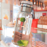Borosilicate Glass Water Bottle 1Litre With Filter Tea Infuser and Protective Sleeve -Imported - Image 2