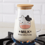 ⁦لبانة حليب زجاجي مقاوم للحرارة سعة 750 مل مع غطاء من الخيزران ومقبض زجاجي⁩ - الصورة ⁦2⁩