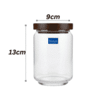 ⁦برطمان زجاجي من أوشن بوب سعة 650 مل مع غطاء خشبي - وعاء محكم الإغلاق لتخزين السكر والتوابل والمكسرات والأطعمة الجافة - صنع في تايلاند⁩ - الصورة ⁦3⁩